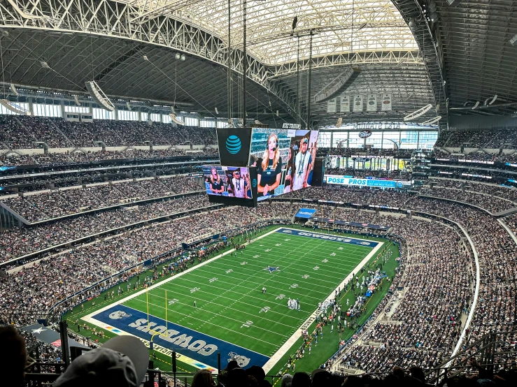 the inside of an empty football stadium with lots of fans