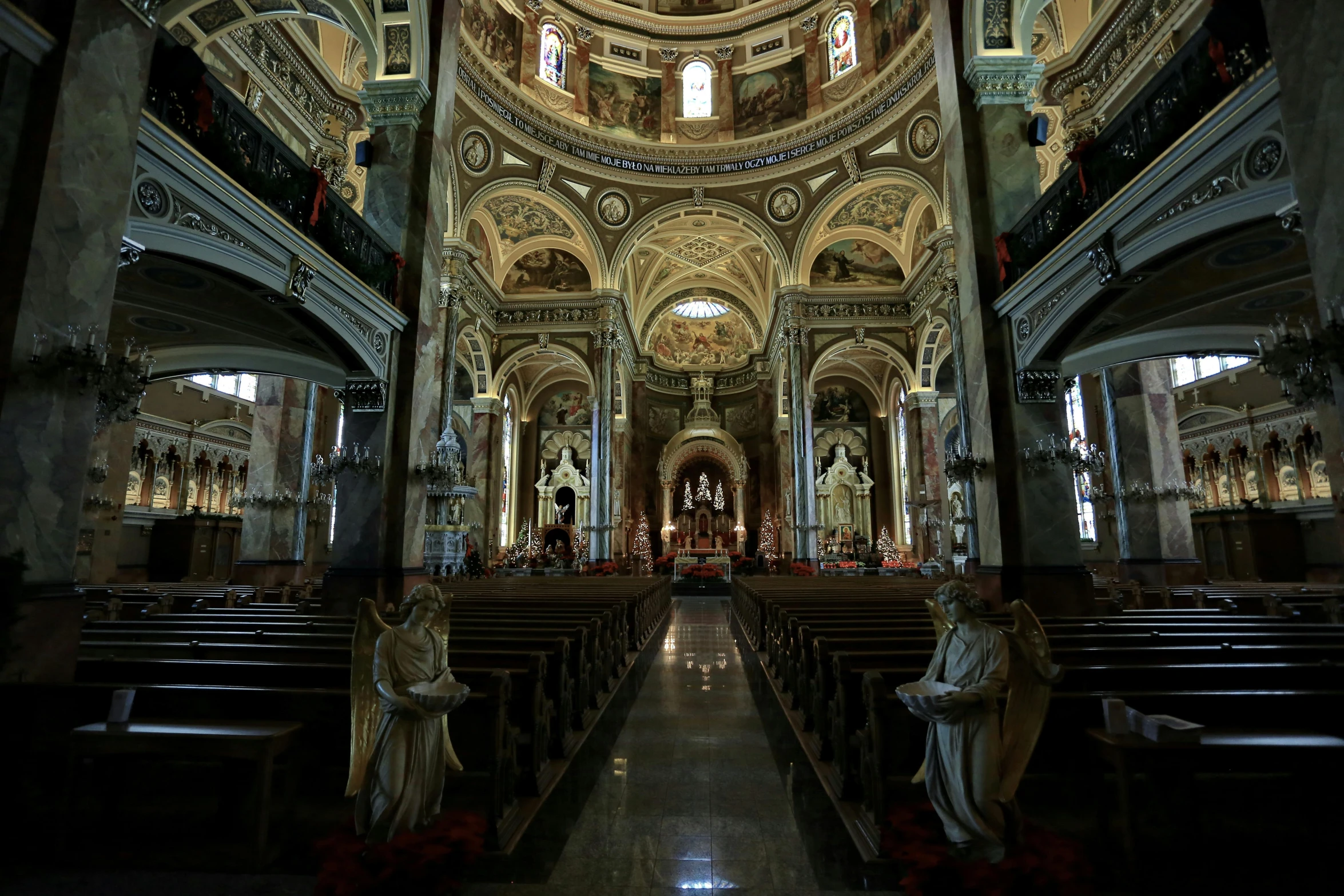 a cathedral is shown with high ceilings and high pews