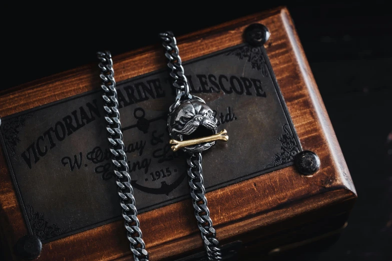 an image of a black anchor and a chain