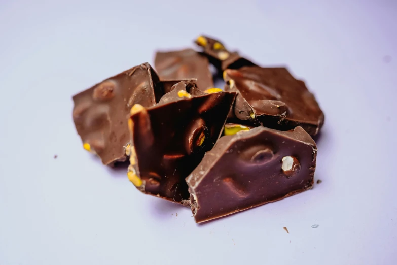 pieces of chocolate with yellow and black sprinkles