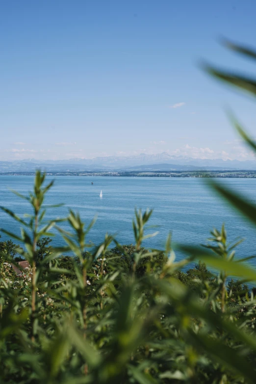 a beautiful view of some distant water and a boat