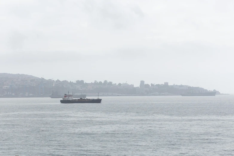 an ocean view of a city and large boats