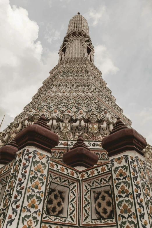 there is a large statue and windows at the top