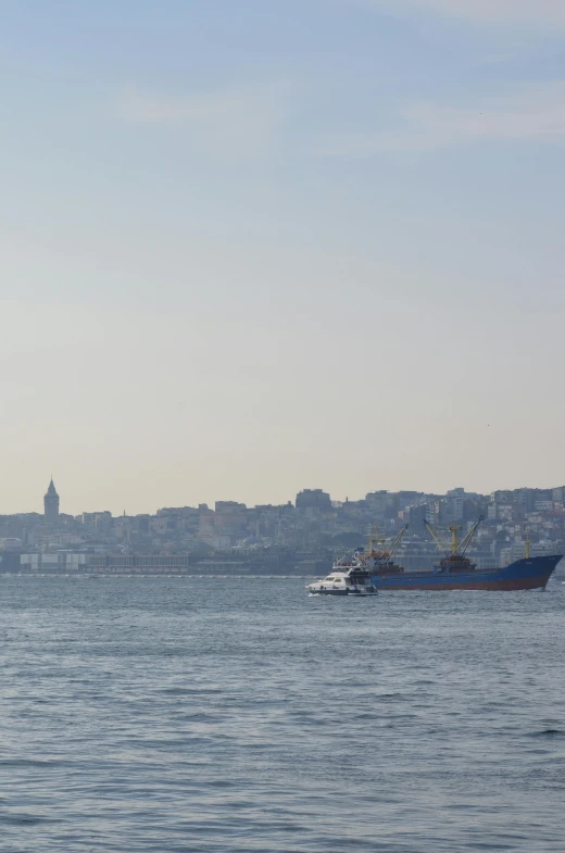 large cargo ship sails away from the port