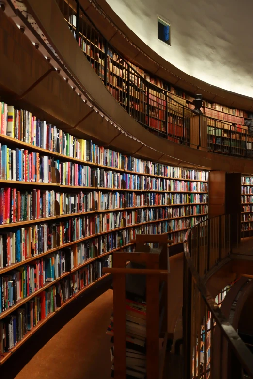 the interior of a liry, with rows of colorful books