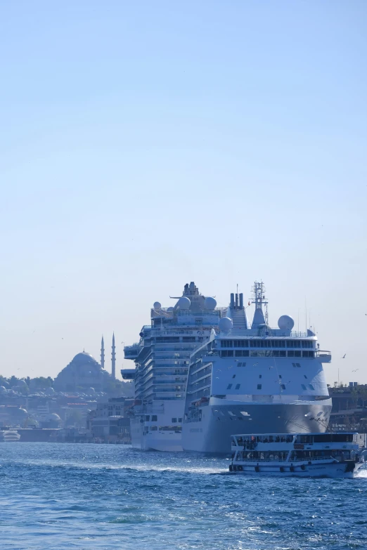 the large cruise ship is in a body of water