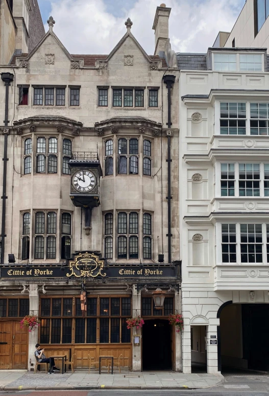 the outside of a building with a clock