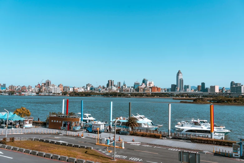 a city skyline as seen across a large body of water