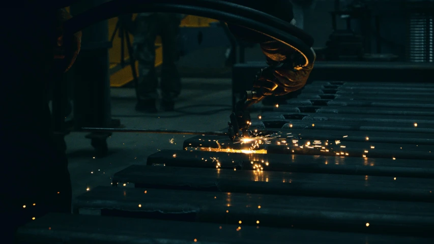 welder  an object in the dark with sparks