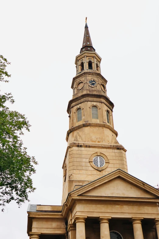 a stone tower with a clock on it