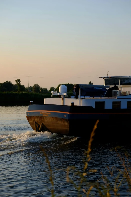 the large boat is moving through the water