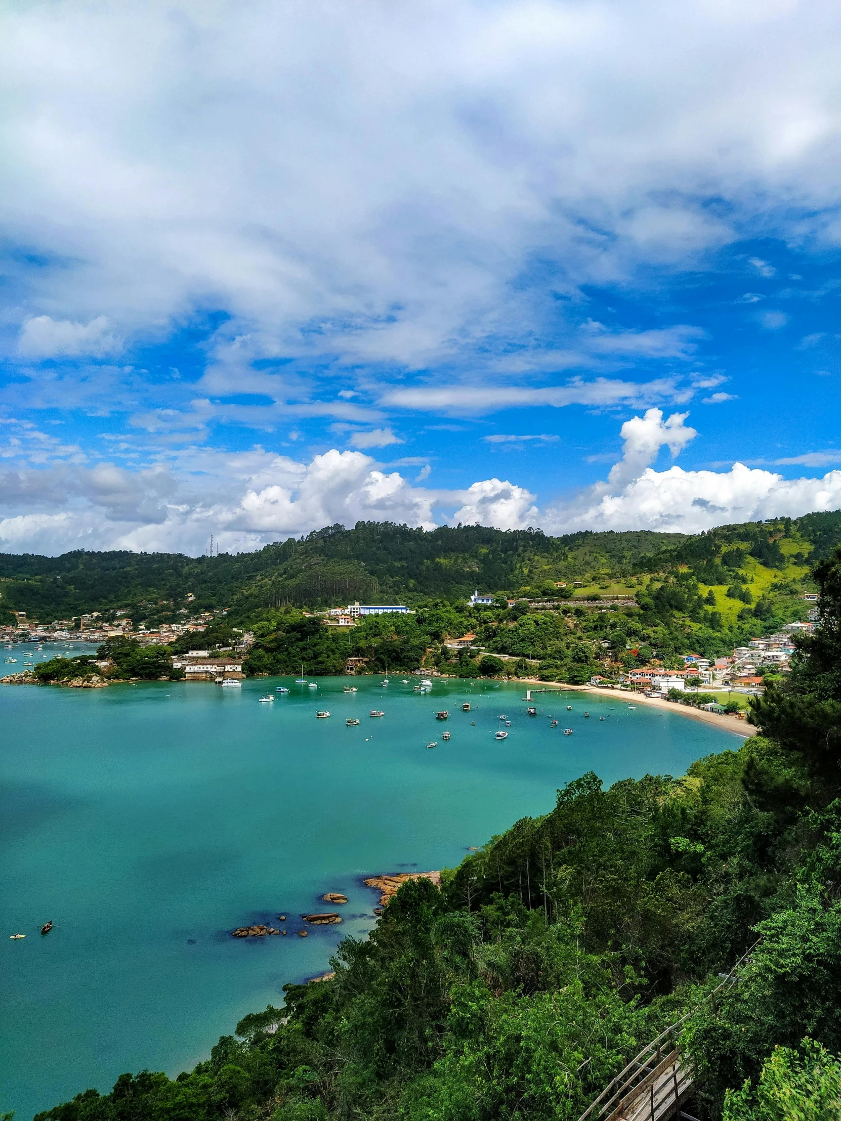 there are many boats in the blue water