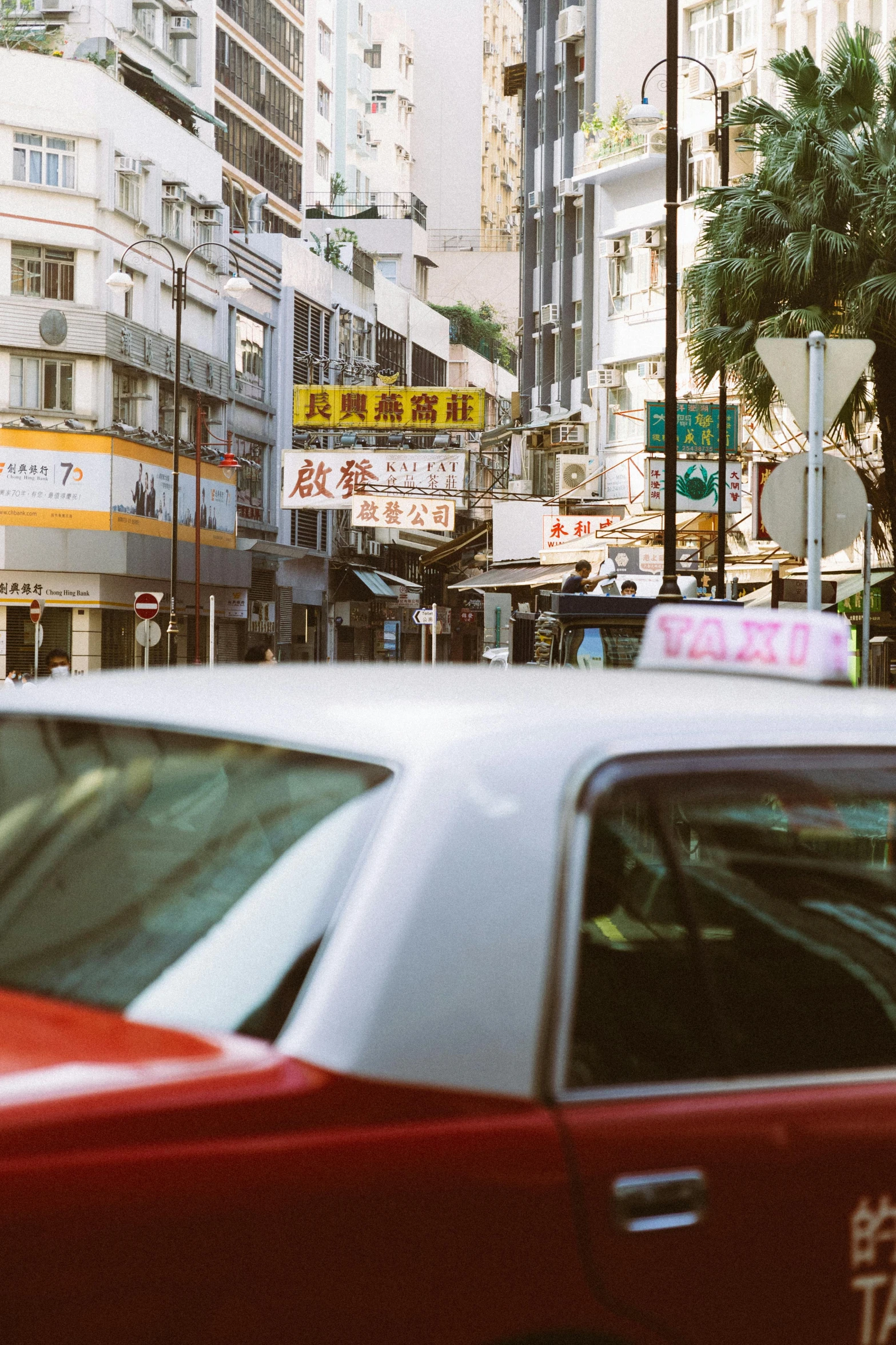 an urban scene with various buildings and a lot of traffic