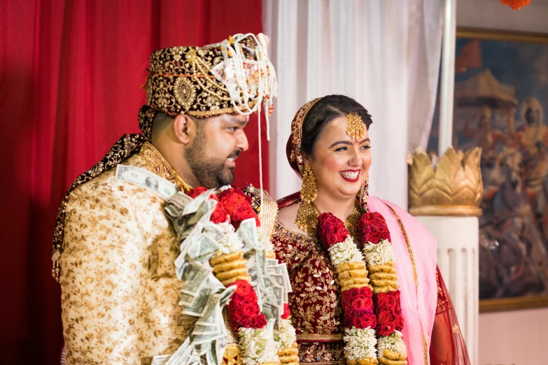 bride and groom posing for pograph in wedding ceremony