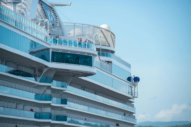 the back of a cruise ship with balcony on top