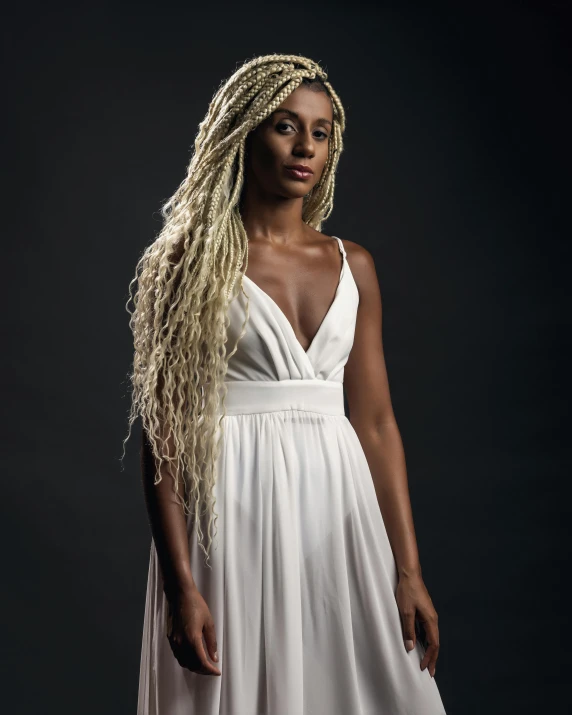 an image of a woman with long hair in a dress