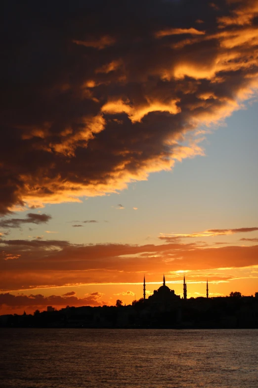 a po of a sunset with a silhouette of the cathedral