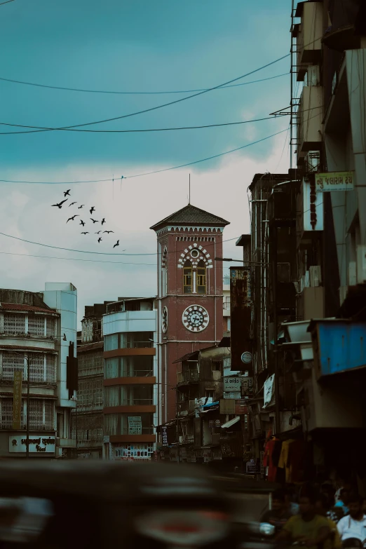 a very tall clock tower with a sky background