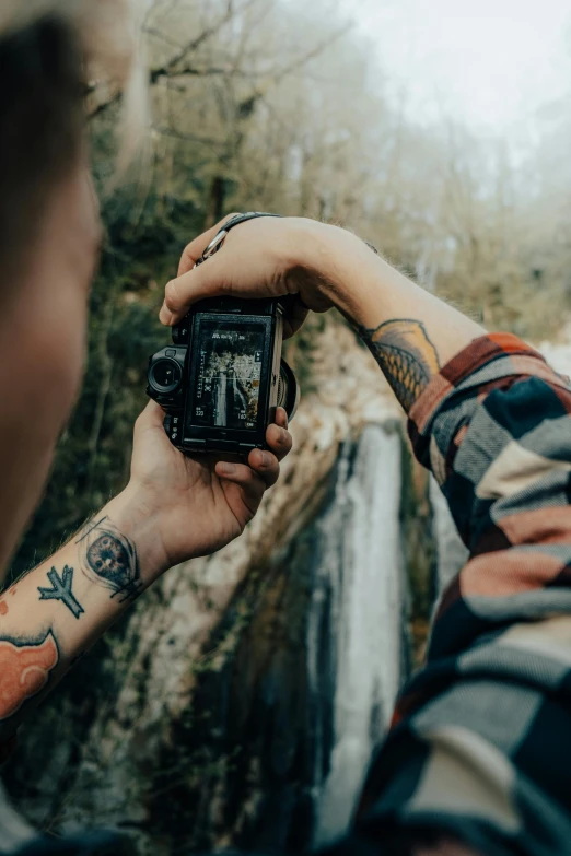 a person is taking a picture with their phone