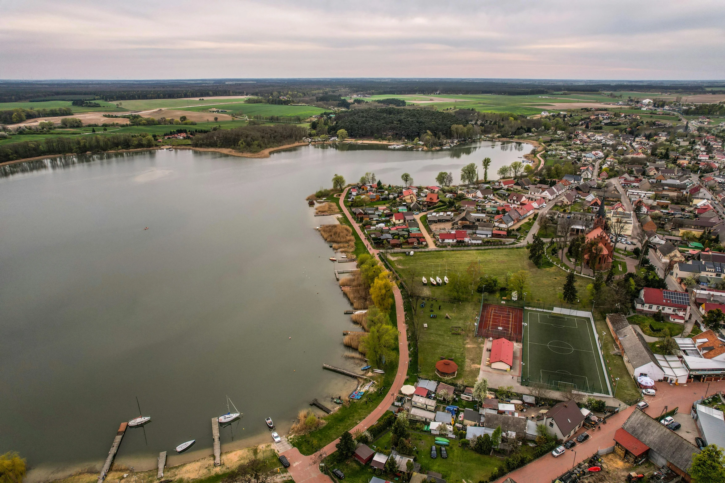 a wide view of a lake with lots of buildings