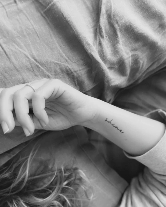 a woman with a name written on her arm