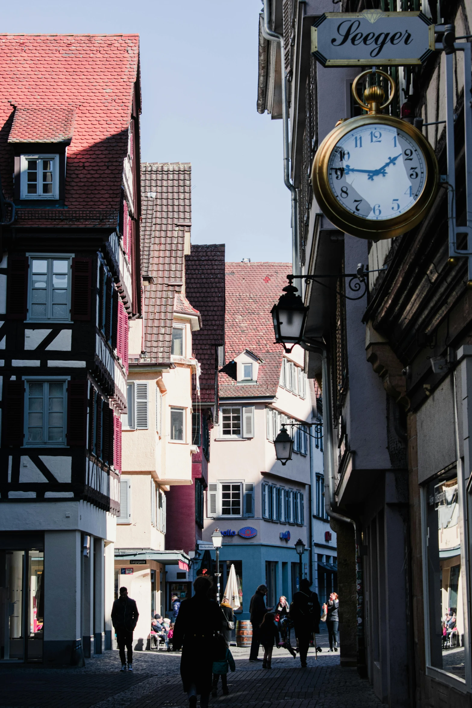 a street that has people walking by it