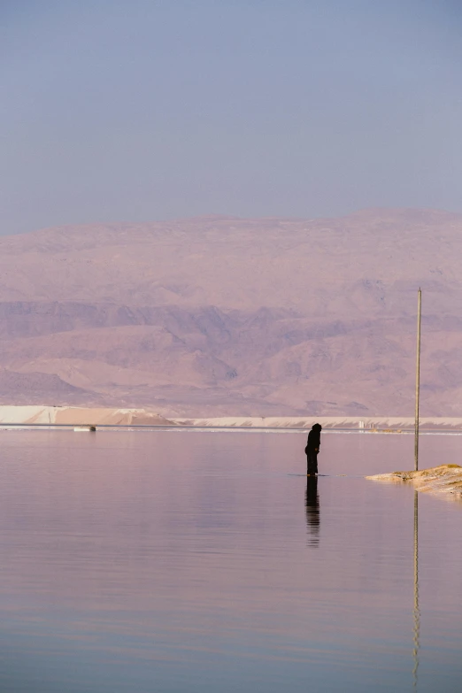 an island sitting in the middle of a lake