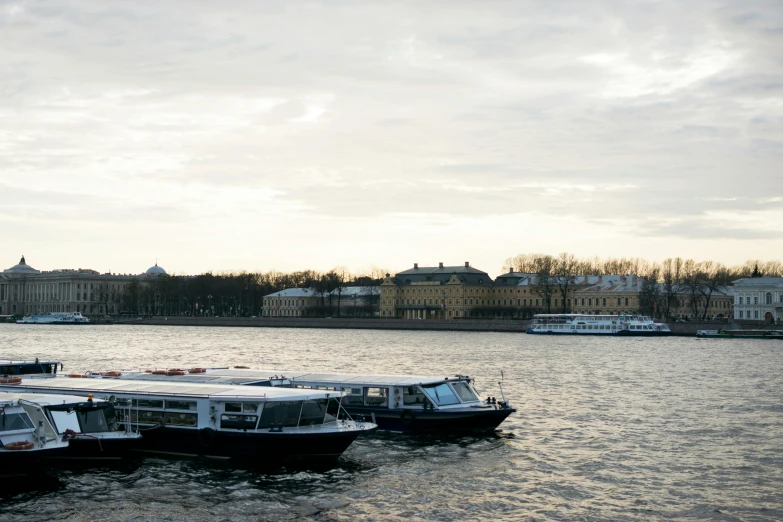 a bunch of boats are docked in the water