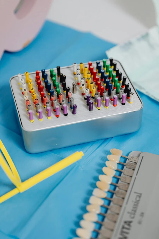 a row of colored hers are placed on a table