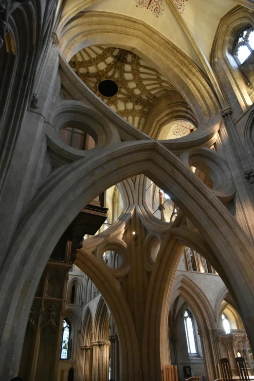 a tall cathedral with many arches and flooring