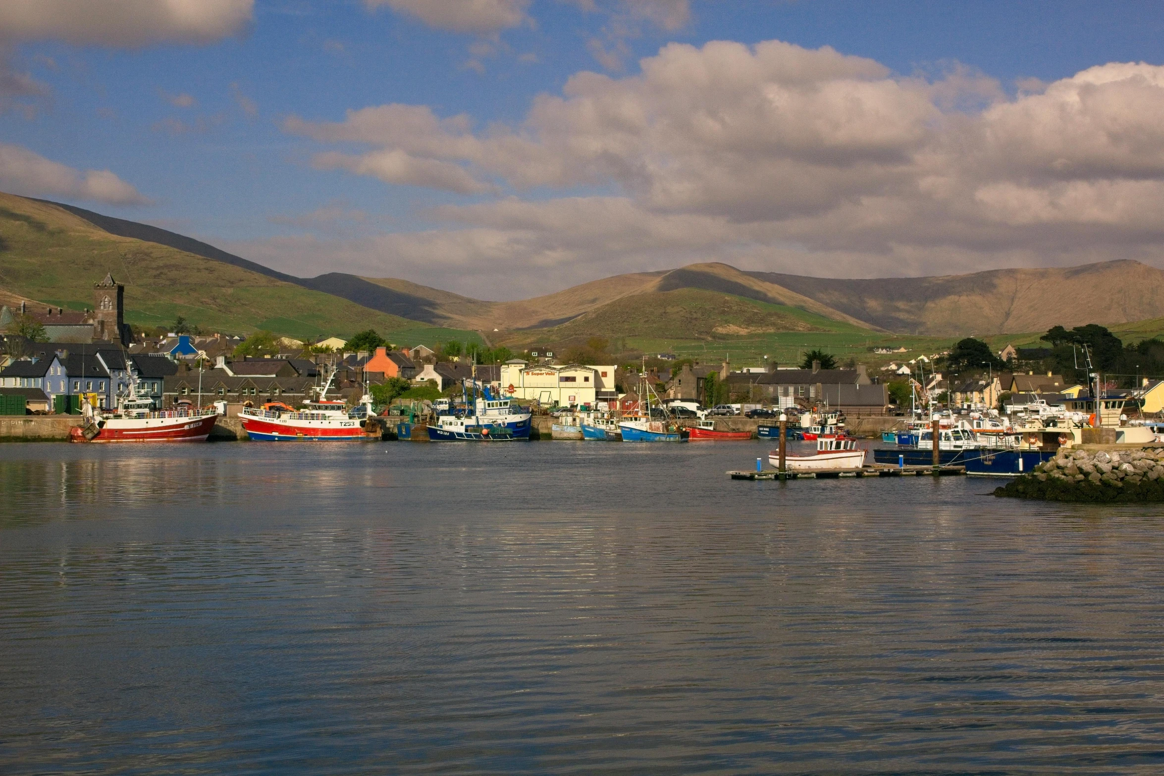 a harbor filled with lots of boats floating in the water