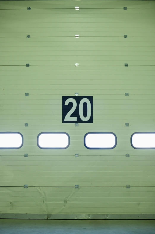 a sign on a closed train door saying 20th