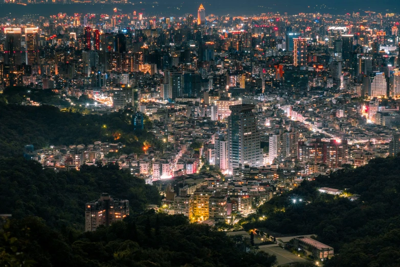 this is a panoramic view of city lights and dark night sky