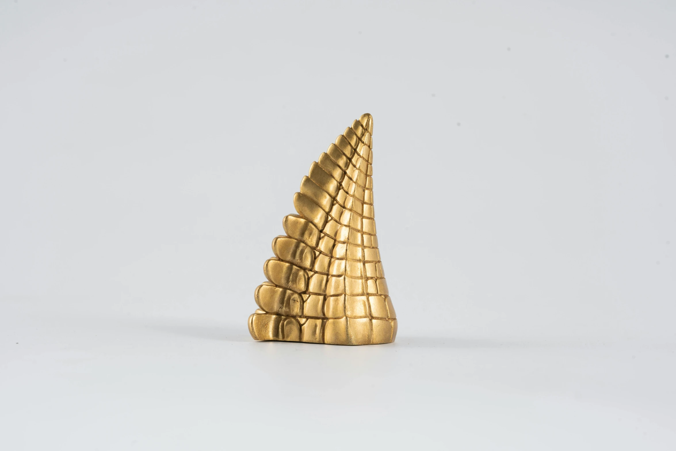 an odd looking object, in the middle of some gold