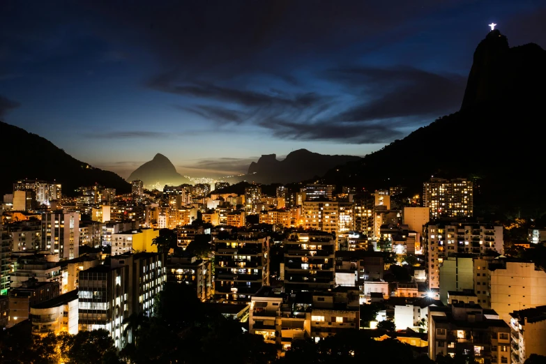 a city lit up by the night sky