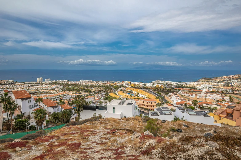 a city on top of a hill with a view