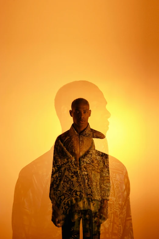 a man in a parka looking down a hill