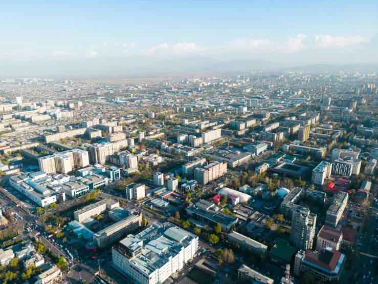 an aerial view of a city that has very high buildings