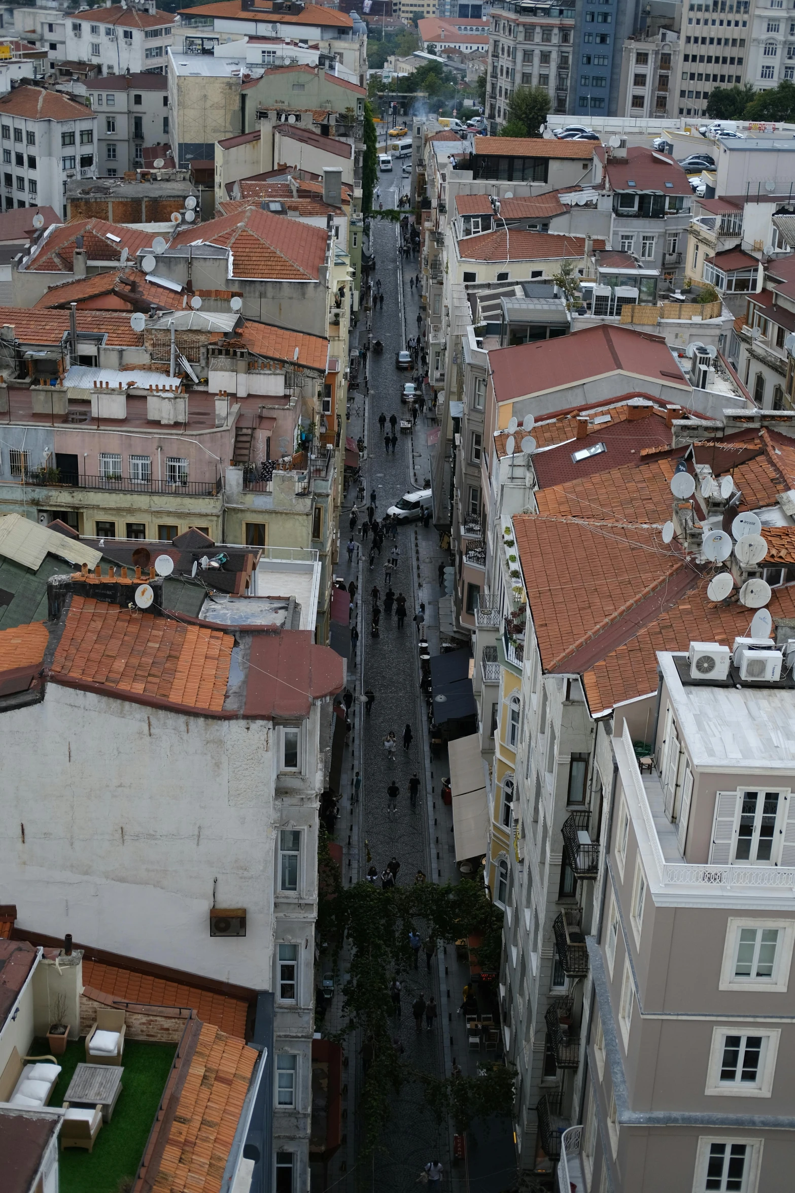 an urban street with houses and rooftops