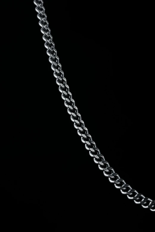 a very long chain with some shiny silver