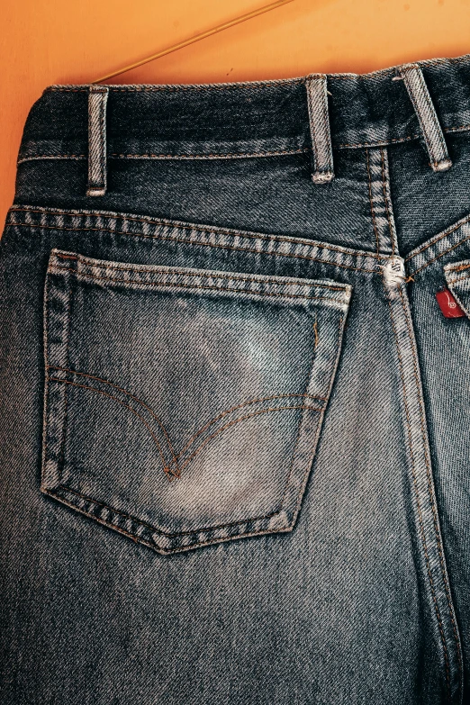 a pair of jeans that have the right amount of on in their pocket