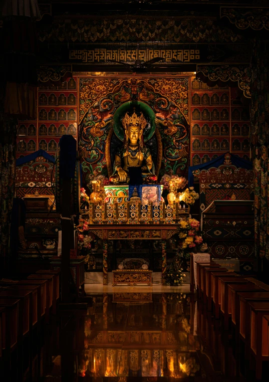 the shrine is surrounded by a wall covered with many shelves