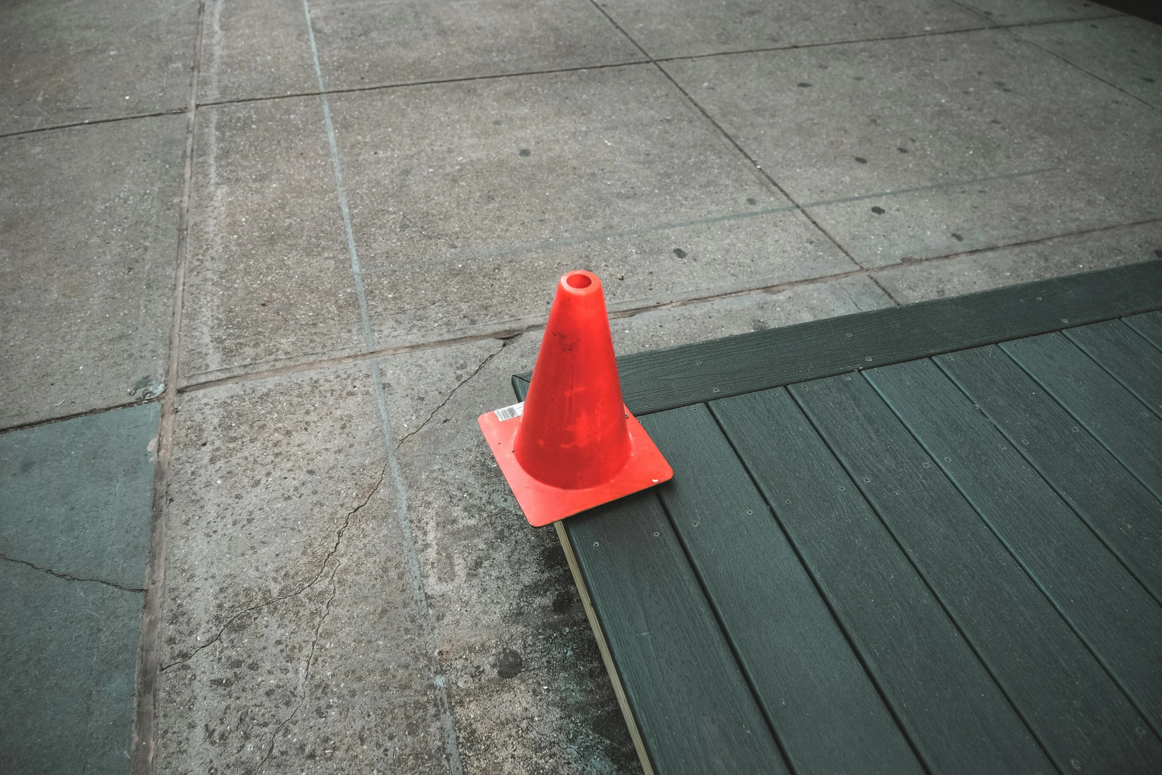 a orange cone with the end marked red