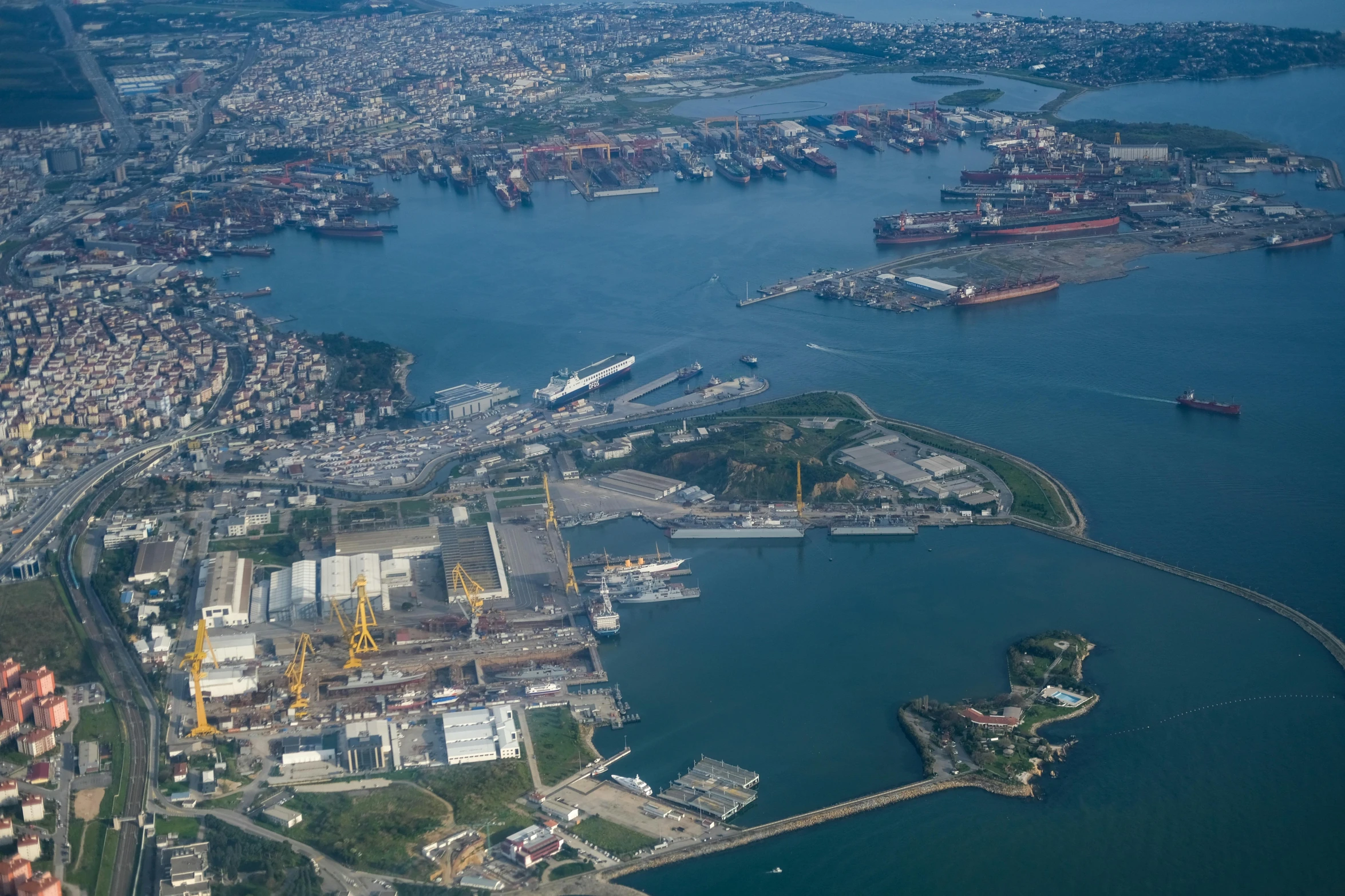 a large harbor with lots of boats floating in it