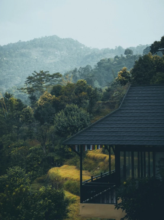 the side of a pavilion in the middle of a field