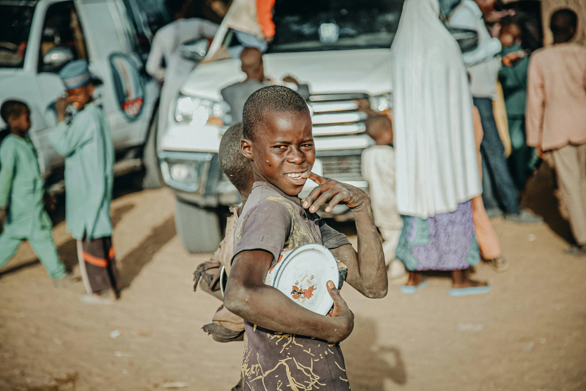 this is an image of the young woman holding a frisbee