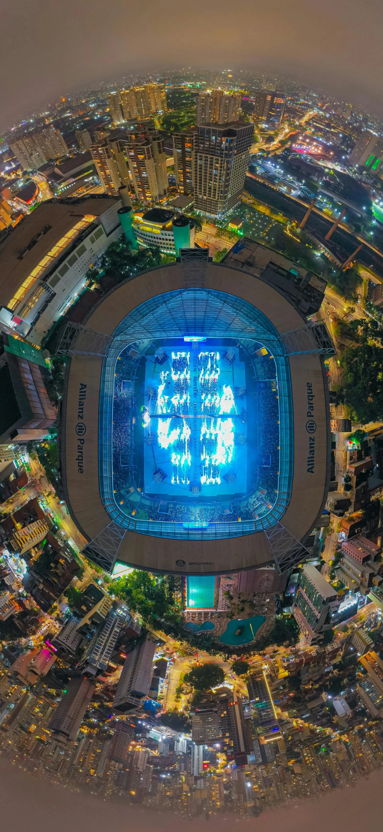 an aerial view of a football stadium at night