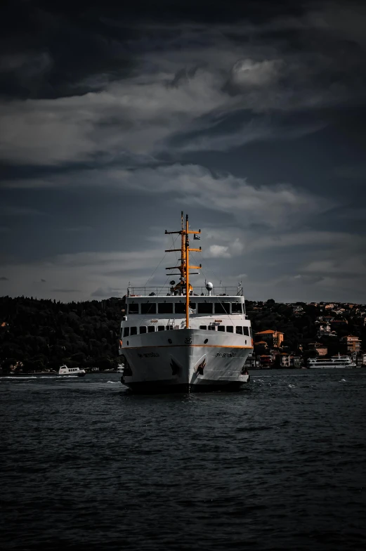 a ship with many masts in the water