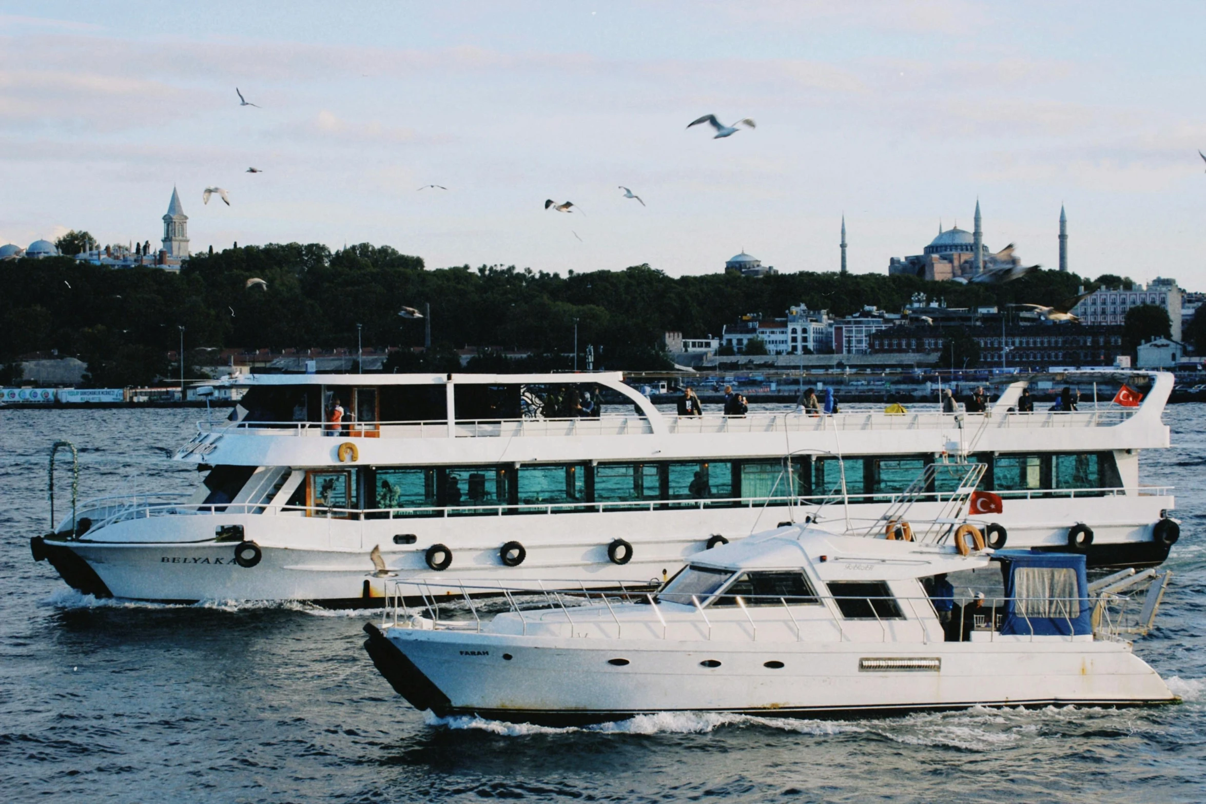 a pair of boats docked in a body of water