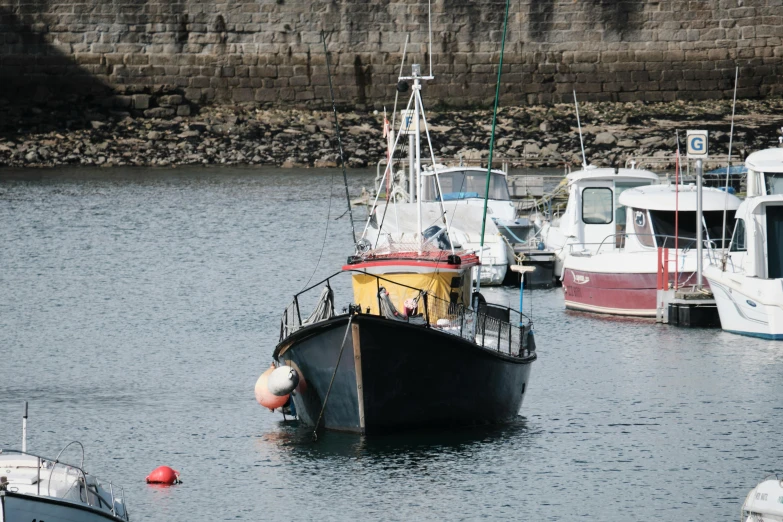 there is a large boat moored at the dock